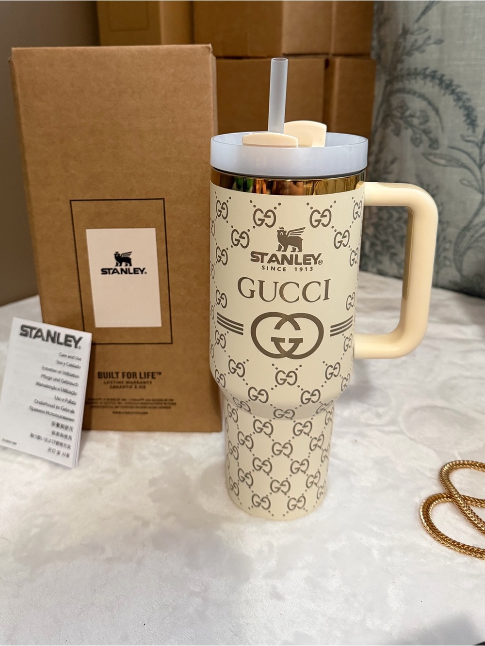 40oz Stanley tumbler cup cream and gold Gucci monogram design